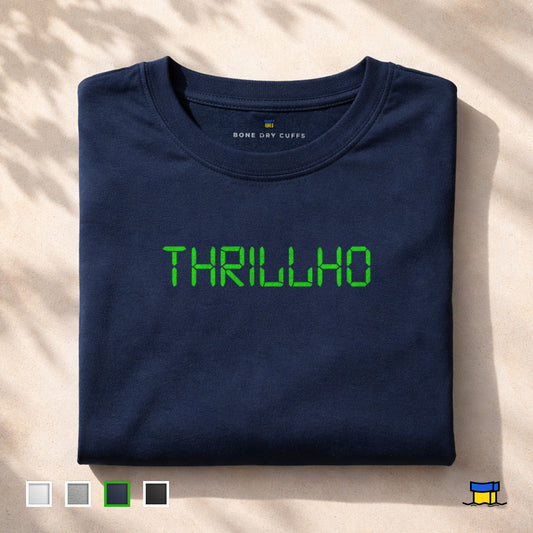 Folded navy blue Simpsons t-shirt featuring 'THRILLHO' in green text